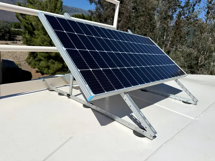 200 watt solar module on a tilted frame mounted on a tank roof